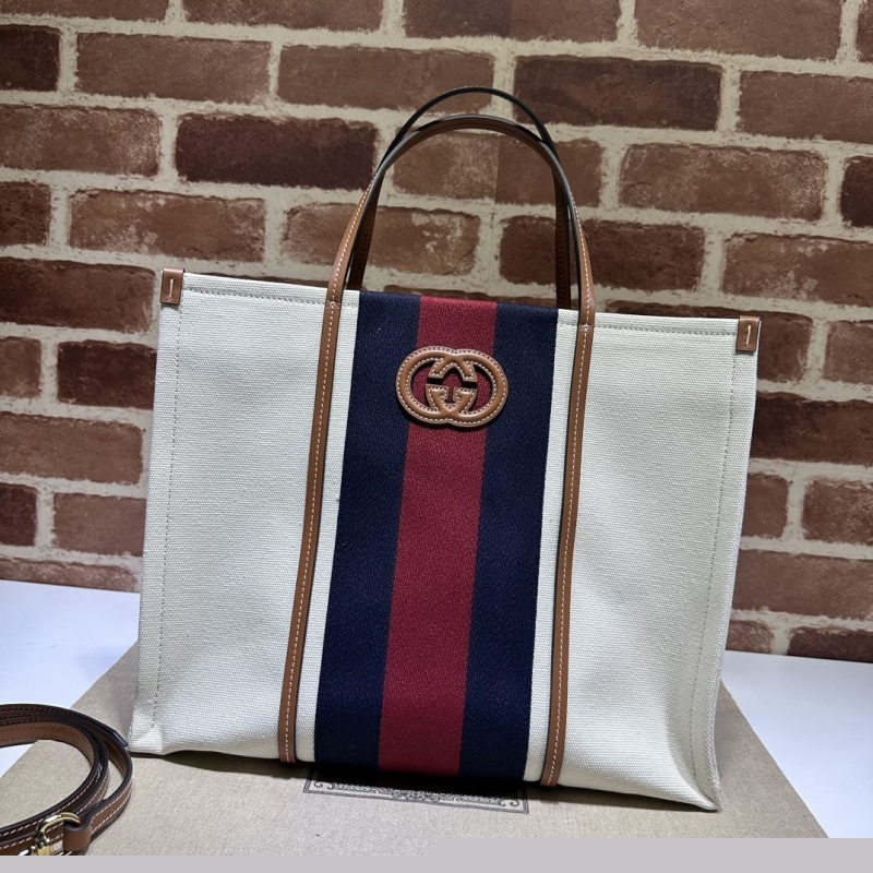 G*u*i shopping bags
